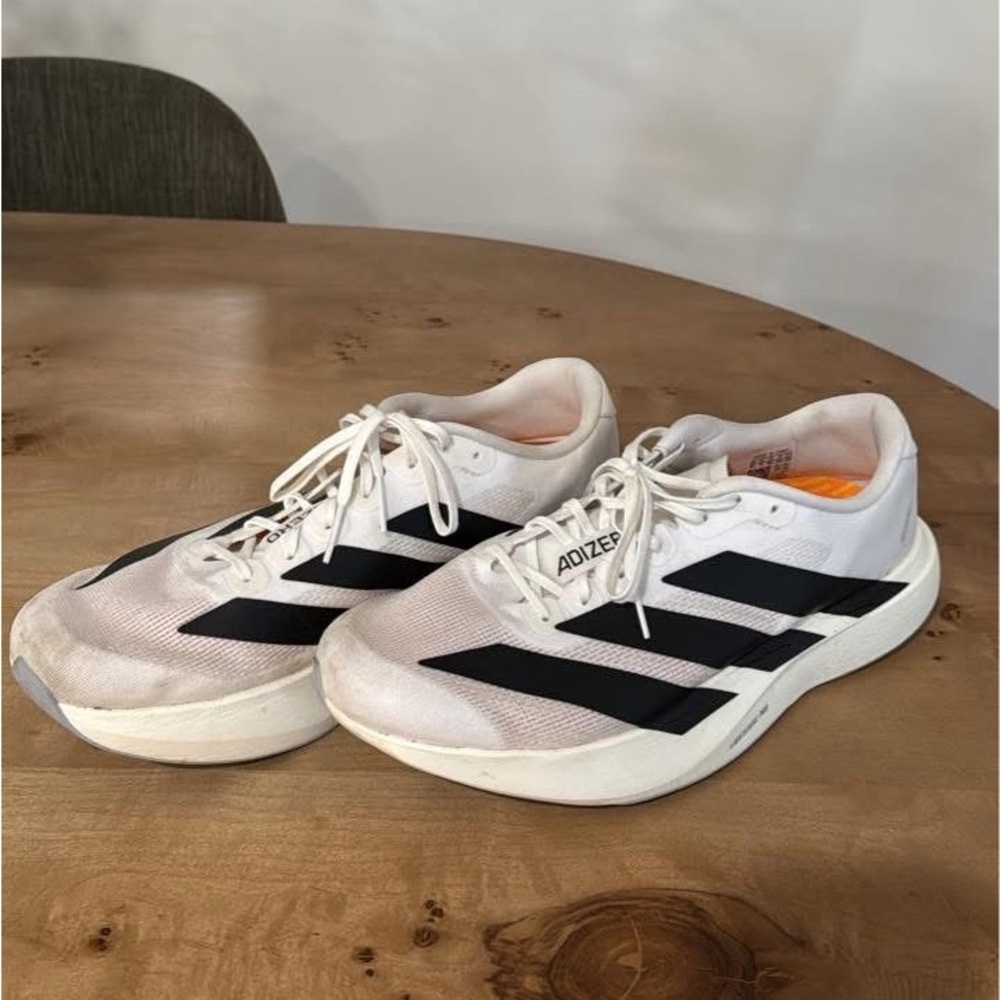 Adidas White and Black running shoes